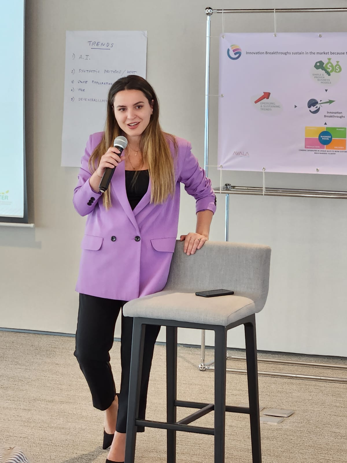 Erila Haska speaking at an innovation workshop
